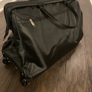 Luggage Rolling Duffle travel bag NWOT